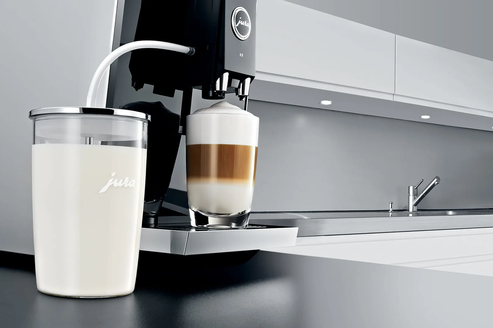 JURA Glass Milk Container connected to JURA machine