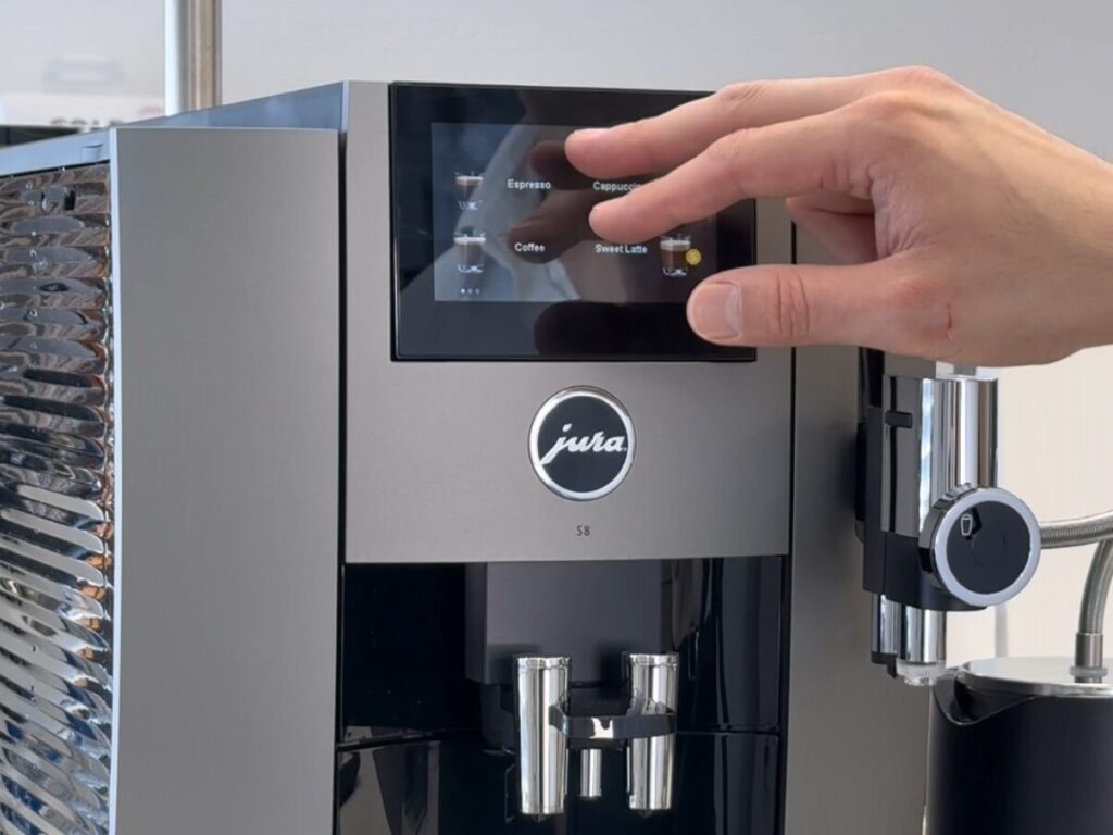 Front view of the new JURA S8 espresso machine with sleek swipeable touchscreen display